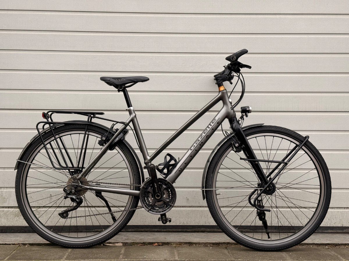 Foto van Gazelle Ultimate Marco Polo T30 Dames Desert titanium grey 53cm M 2018 (2018) via De Kromme Spaak